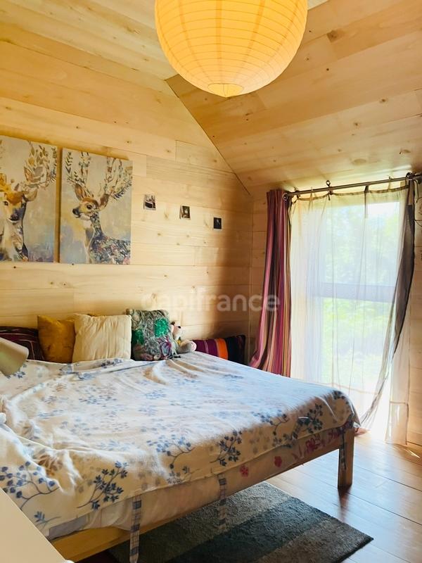 Maison de bois - 140 m² - 9 pièces