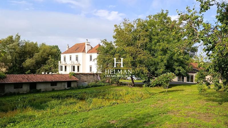 Maison - 311 m² - 12 pièces