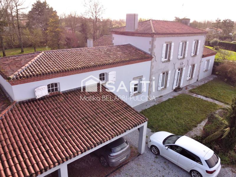 Maison - 201 m² - 7 pièces