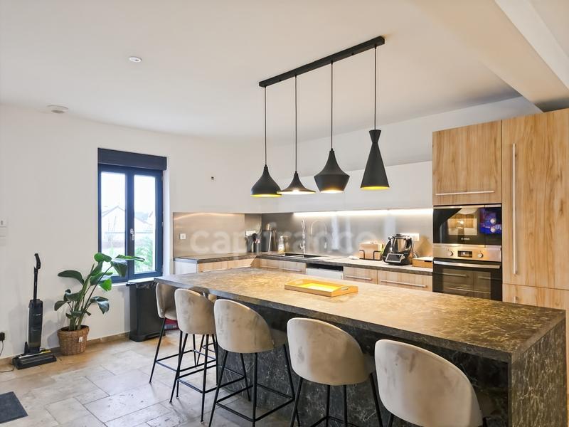 Maison - 200 m² - 7 pièces