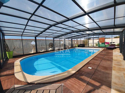 Maison - 216 m² - 7 pièces