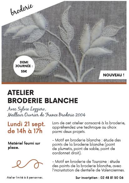 Démonstration de broderie blanche