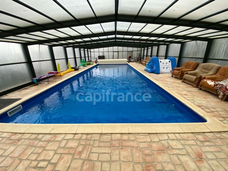 Maison - 424 m² - 14 pièces