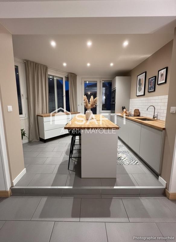 Maison - 99 m² - 5 pièces