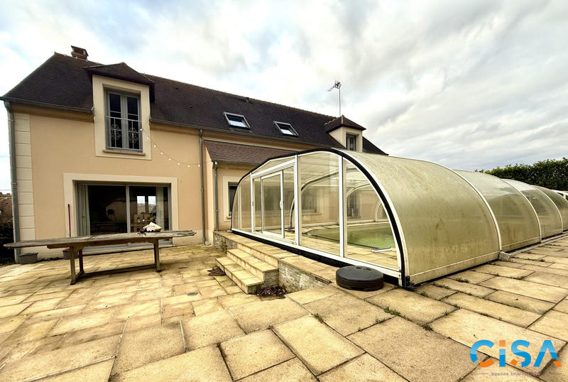 Maison - 195 m² - 7 pièces