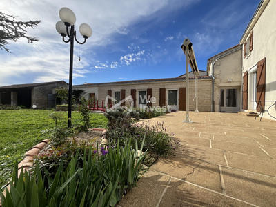 Maison - 240 m² - 7 pièces