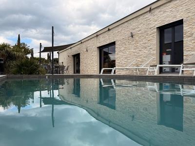 Maison - 128 m² - 5 pièces