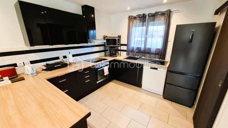 Maison traditionnelle - 88 m² - 4 pièces