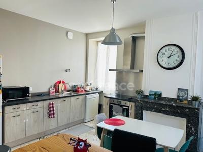 Appartement ancien - 97 m² - 3 pièces