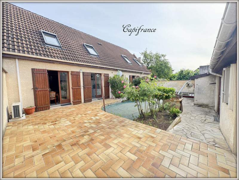 Maison - 165 m² - 8 pièces