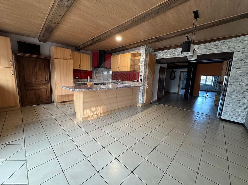 Maison - 240 m² - 7 pièces