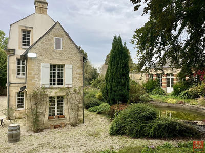 Maison - 335 m² - 10 pièces