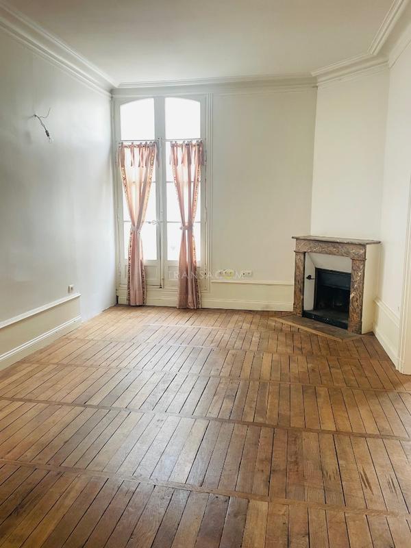 Appartement haussmannien - 101 m² - 4 pièces