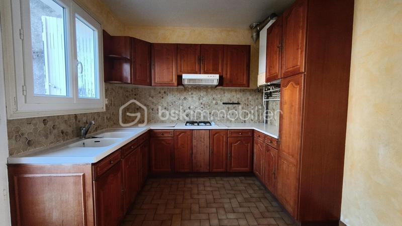 Maison traditionnelle - 111 m² - 5 pièces