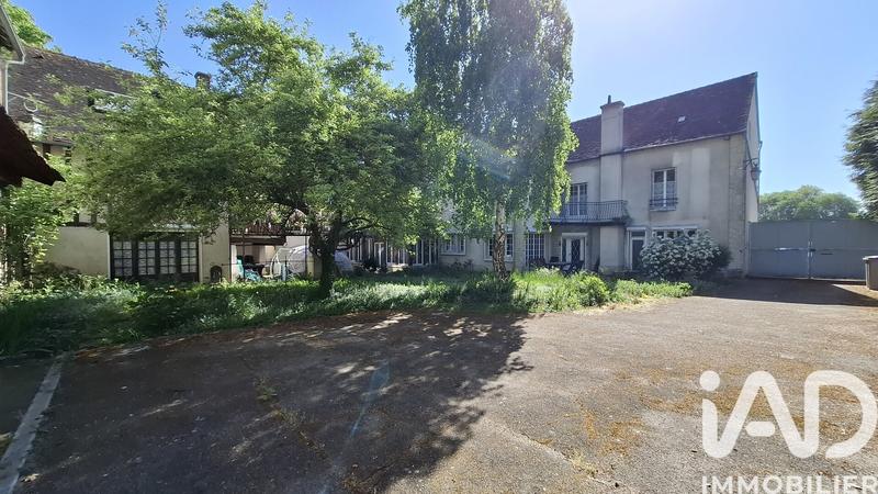 Maison de ville - 458 m² - 14 pièces