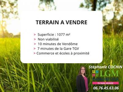 Terrain constructible - 1 077 m²