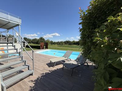 Maison - 210 m² - 7 pièces