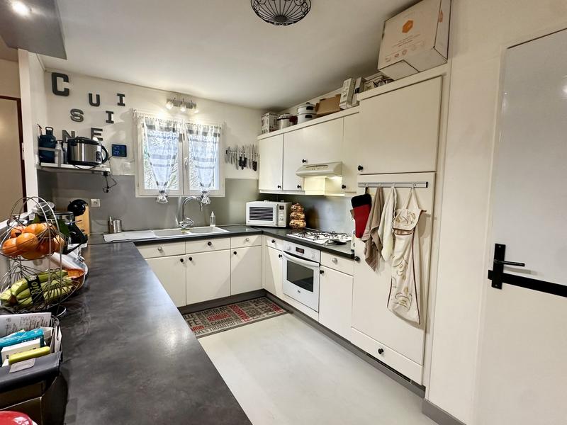 Maison traditionnelle - 111 m² - 5 pièces