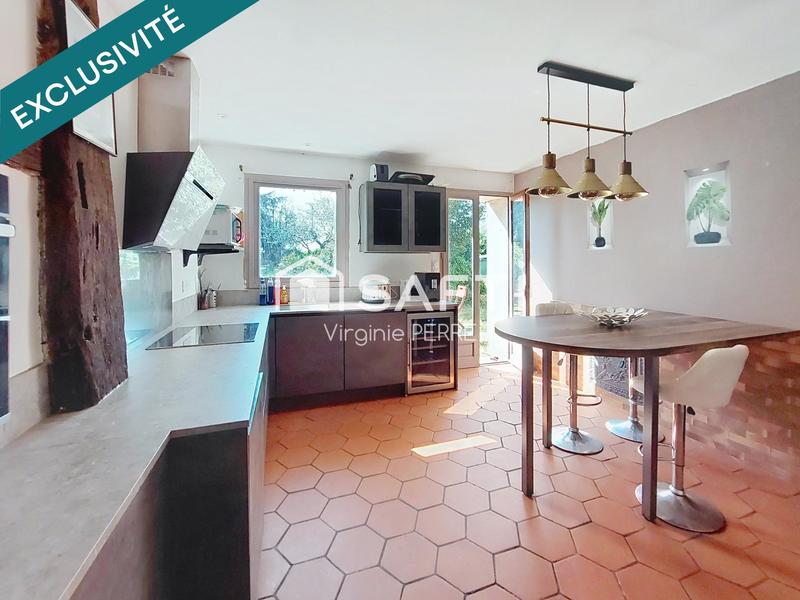 Maison - 200 m² - 7 pièces