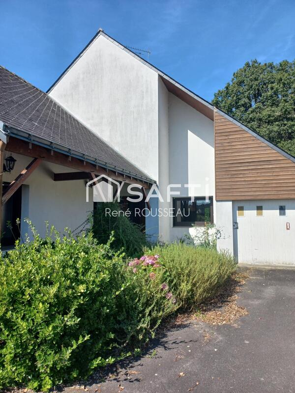 Maison - 95 000 m² - 6 pièces