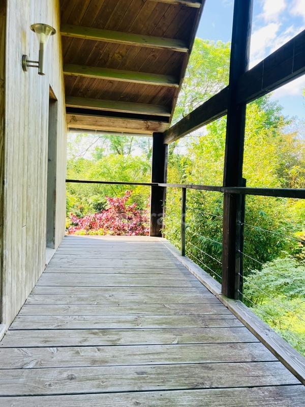 Maison de bois - 140 m² - 9 pièces