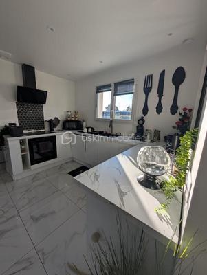 Maison - 112 m² - 5 pièces