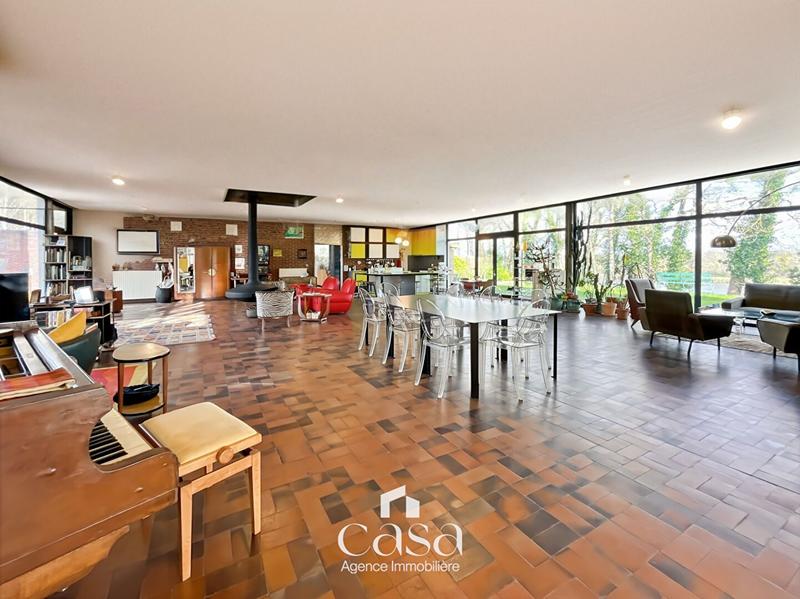 Maison - 408 m² - 9 pièces